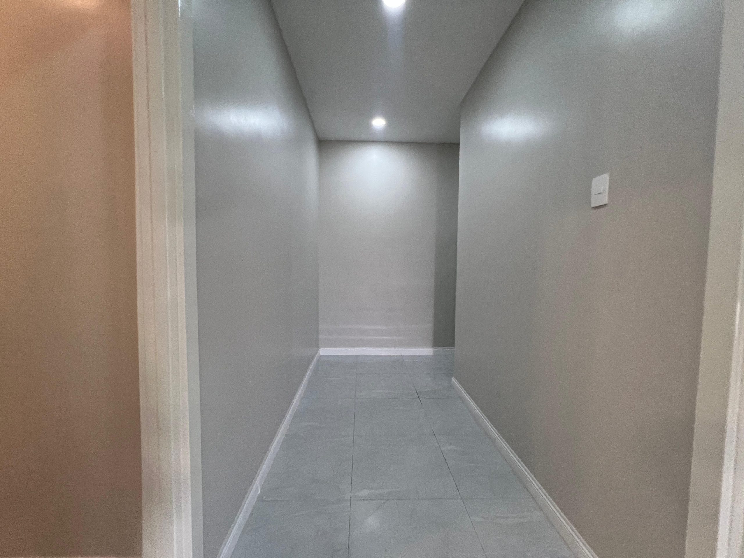 Halo Place apartment hallway interior two-bedroom Trinidad