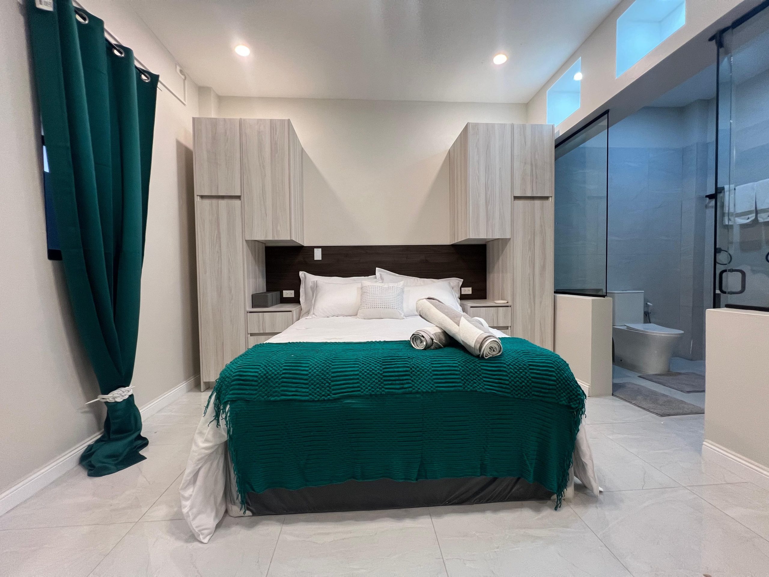 Halo Place master bedroom king bed glass wall eastern Trinidad